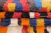 a close up of many different colored ties 